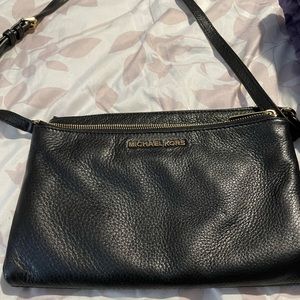 Michael Kors black crossbody with magnetic snap closures
